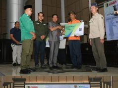 Bupati Warisin Serahkan Bantuan Iuran Kepesertaan Program Jaminan Sosial Ketenagakerjaan Bagi Guru Ngaji, Marbot, Ketua RT dan Kepala LingkunganÂ